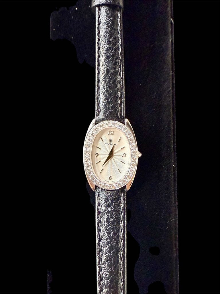 18KT CYMA LADIES WATCH 5/8TW WITH LEATHER BAND