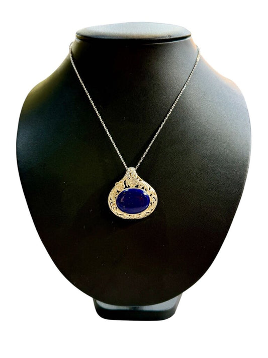 SS OVAL LAPIS BEZEL SET W/SCROLLING FLOWER PENDANT ON CHAIN
