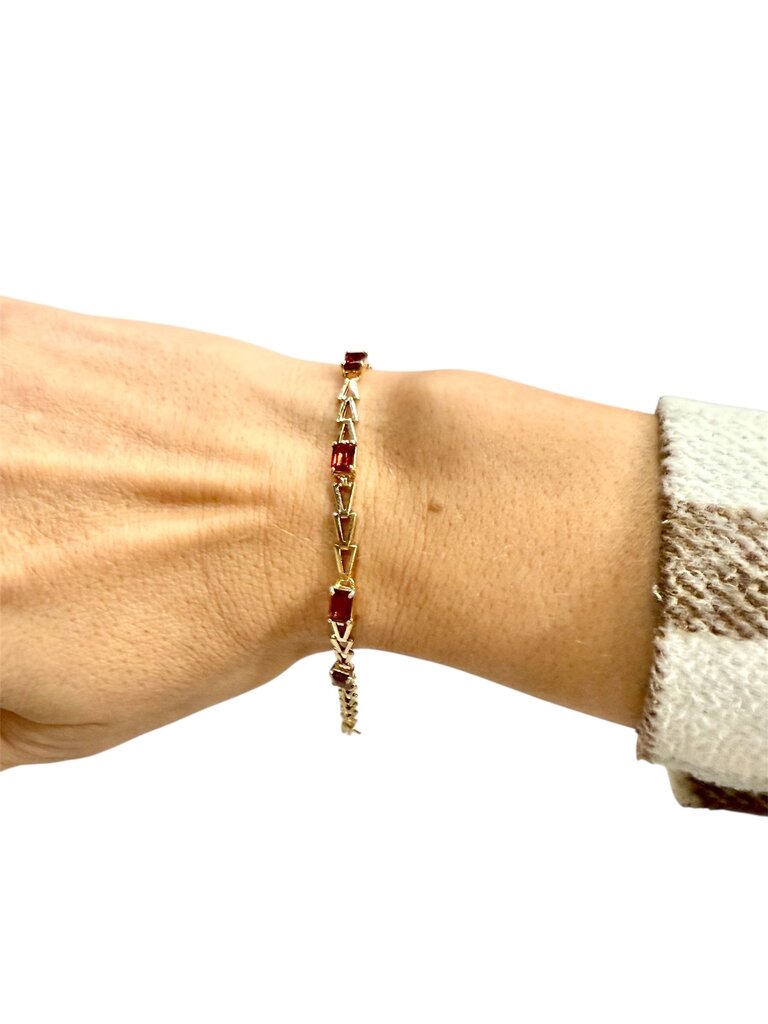 14KT YG EMERALD CUT GARNET TENNIS BRACELET