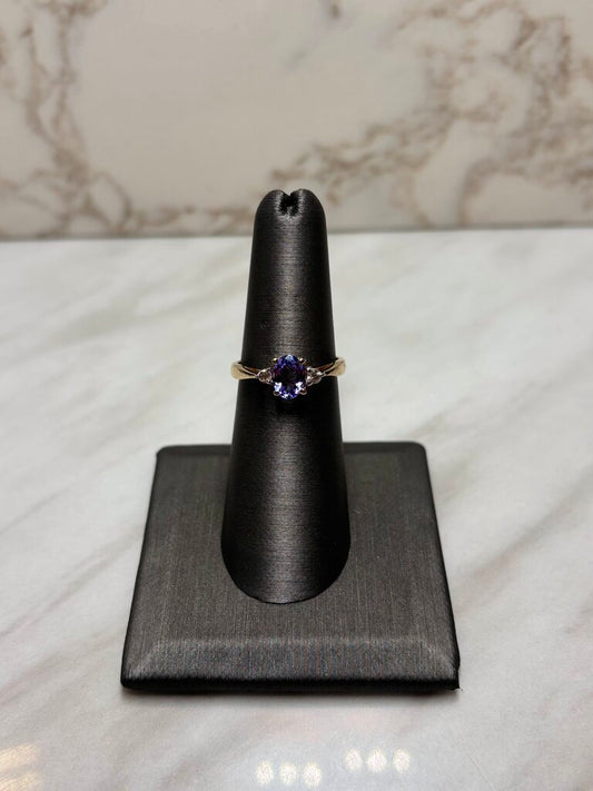 14KT YG STAMPED .73CT OVAL TANZ W/MELEE RING SZ 7
