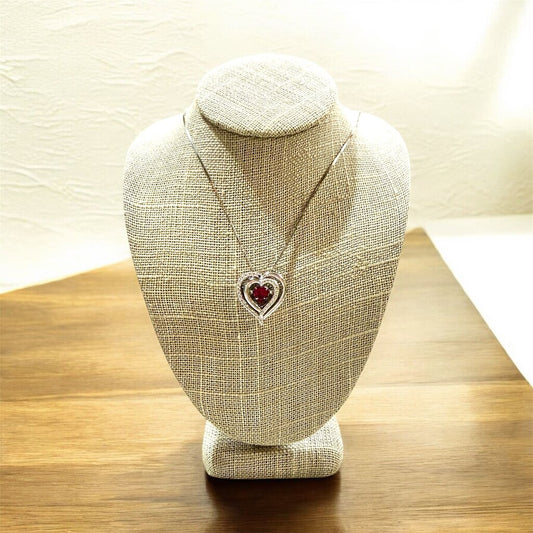 SS RUBY HEART SHAPE STONE BEATING HEART ON CHAIN