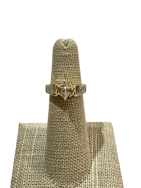 14KT YG 3/8CT MARQ CTR W/PC CHANNEL SET DIAMONDS 1CTTW SZ 4.5