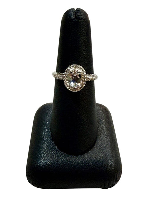 SS OVAL WHITE TOPAZ HALO STYLE RING SZ 7