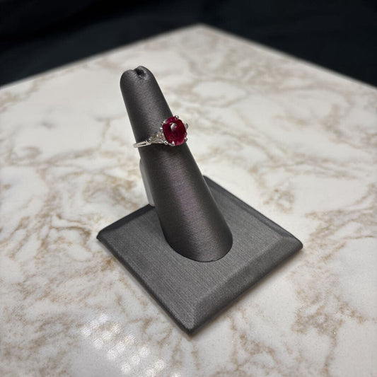 PLAT LARGE OVAL RUBY W/TRILLION CT DIAMONDS