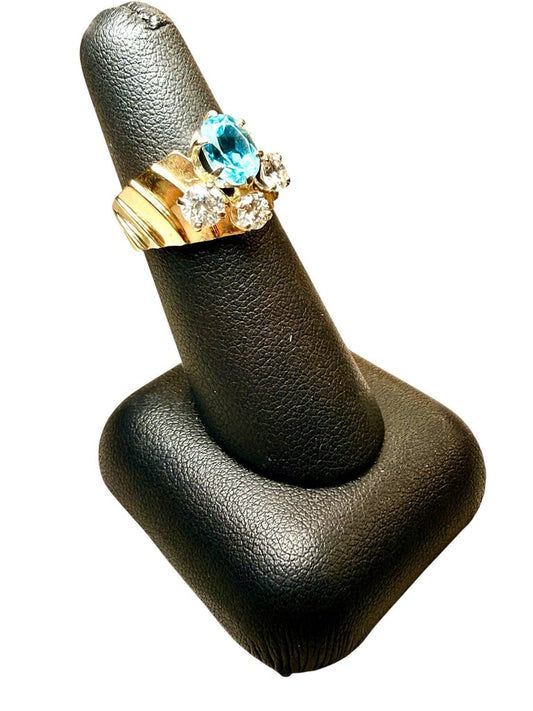 14KT YG WIDE BAND W/LG OVAL BLUE TOPAZ W/3RB MELEE