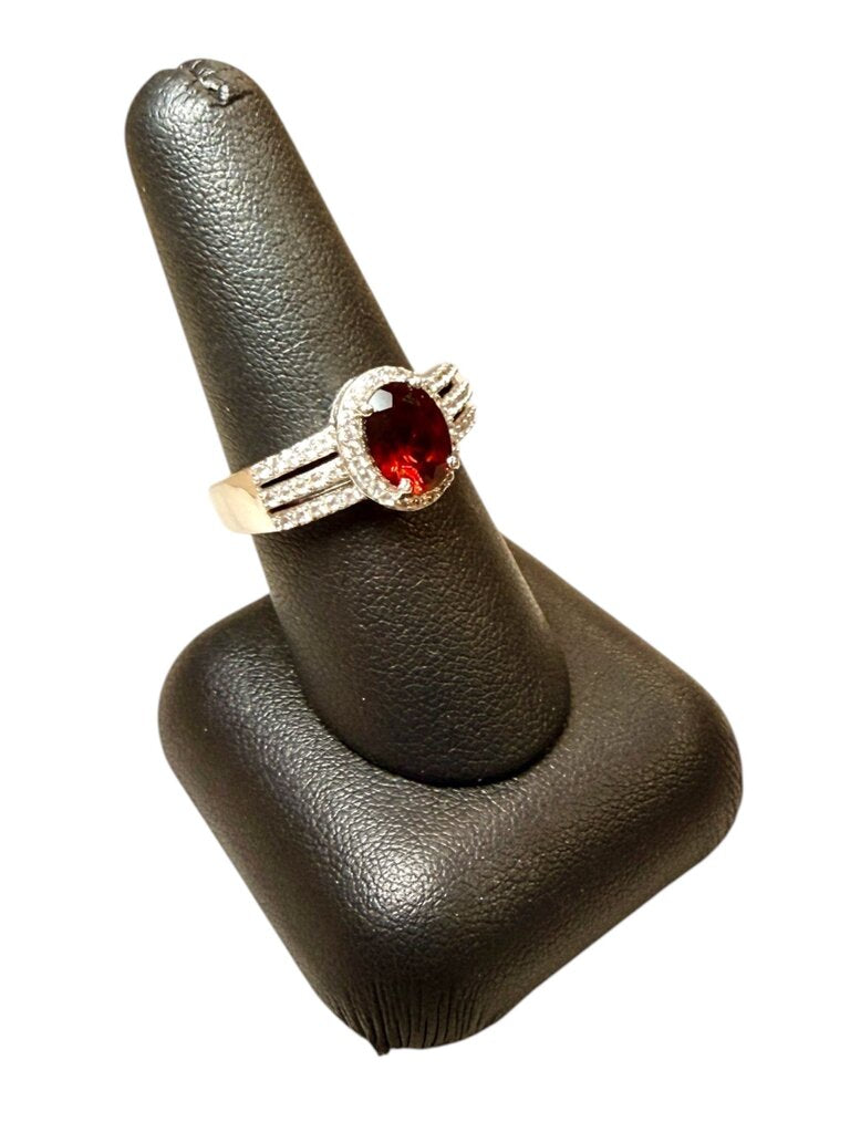 SS OVAL GARNET W/HALO RING SZ 8