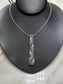 14KT WG BLUE SAPPHIRE &DIA STICK PENDANT ON CHAIN W/PAPERS