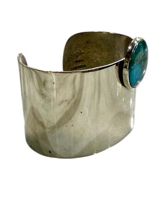 SS WIDE SILVER CUFF W/ ROUND TURQ BEZEL SET STONE