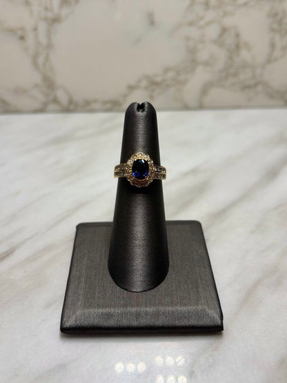 18KT YG SAPPHIRE CTR W/DIA HALO 1/2TW SZ 6