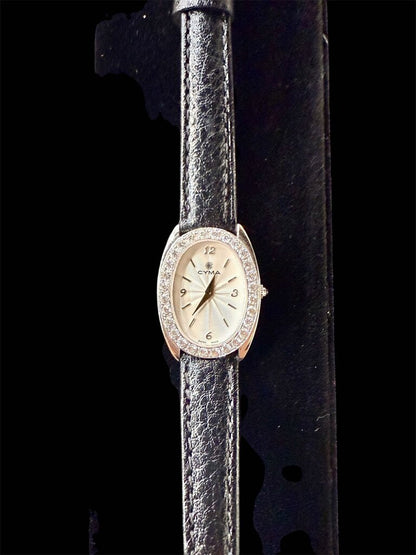 18KT CYMA LADIES WATCH 5/8TW WITH LEATHER BAND