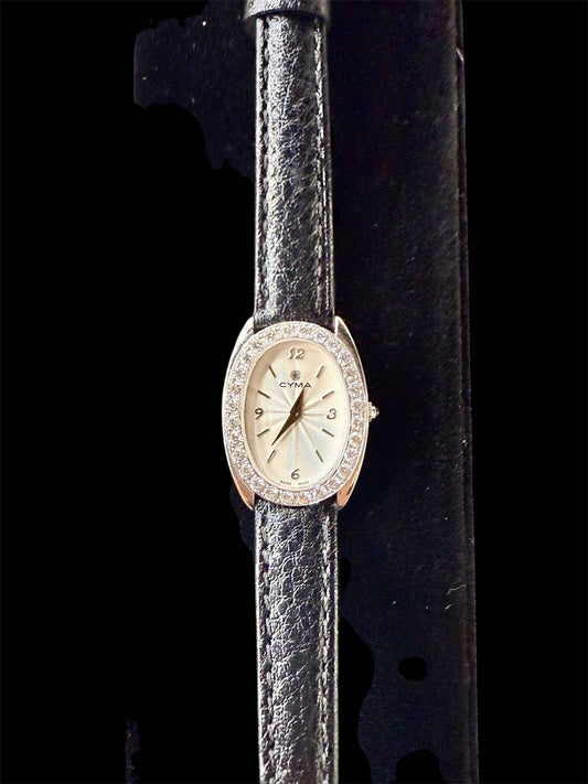 18KT CYMA LADIES WATCH 5/8TW WITH LEATHER BAND