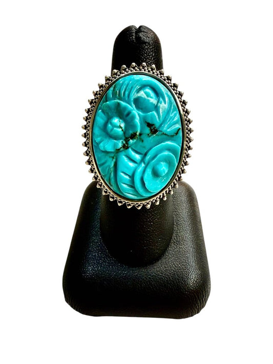 SS LARGE CARVED STONE FLOWER BEZEL SET WITH BEADED HALO SZ 7