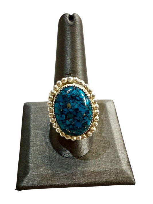 SS CREATED TURQ BEZEL SET W/BEADED HALO WIDE BAND SZ 10