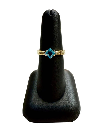 14KT YG BLUE TOPAZ W/MELEE SZ 7