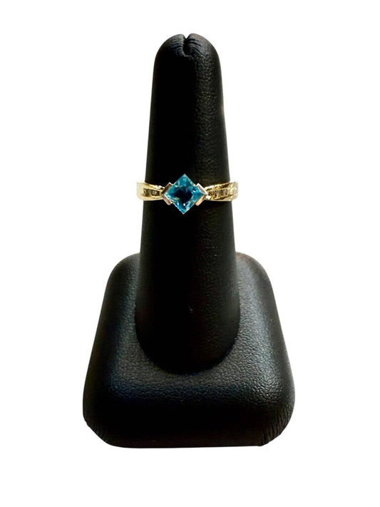 14KT YG BLUE TOPAZ W/MELEE SZ 7