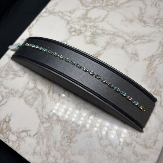 10KT YG OVAL BLUE TOPAZ BRACELET