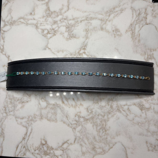 10KT YG OVAL BLUE TOPAZ BRACELET