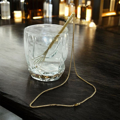 14KT T&CO TWISLER COCKTAIL STIRRER PENDANT ON 22" CHAIN