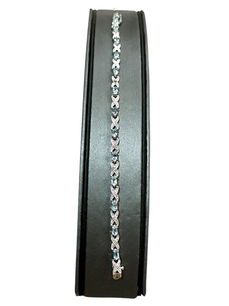 SS OVAL BLUE TOPAZ TENNIS BRACELET