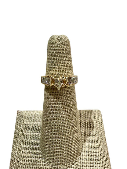 14KT YG 3/8CT MARQ CTR W/PC CHANNEL SET DIAMONDS 1CTTW SZ 4.5