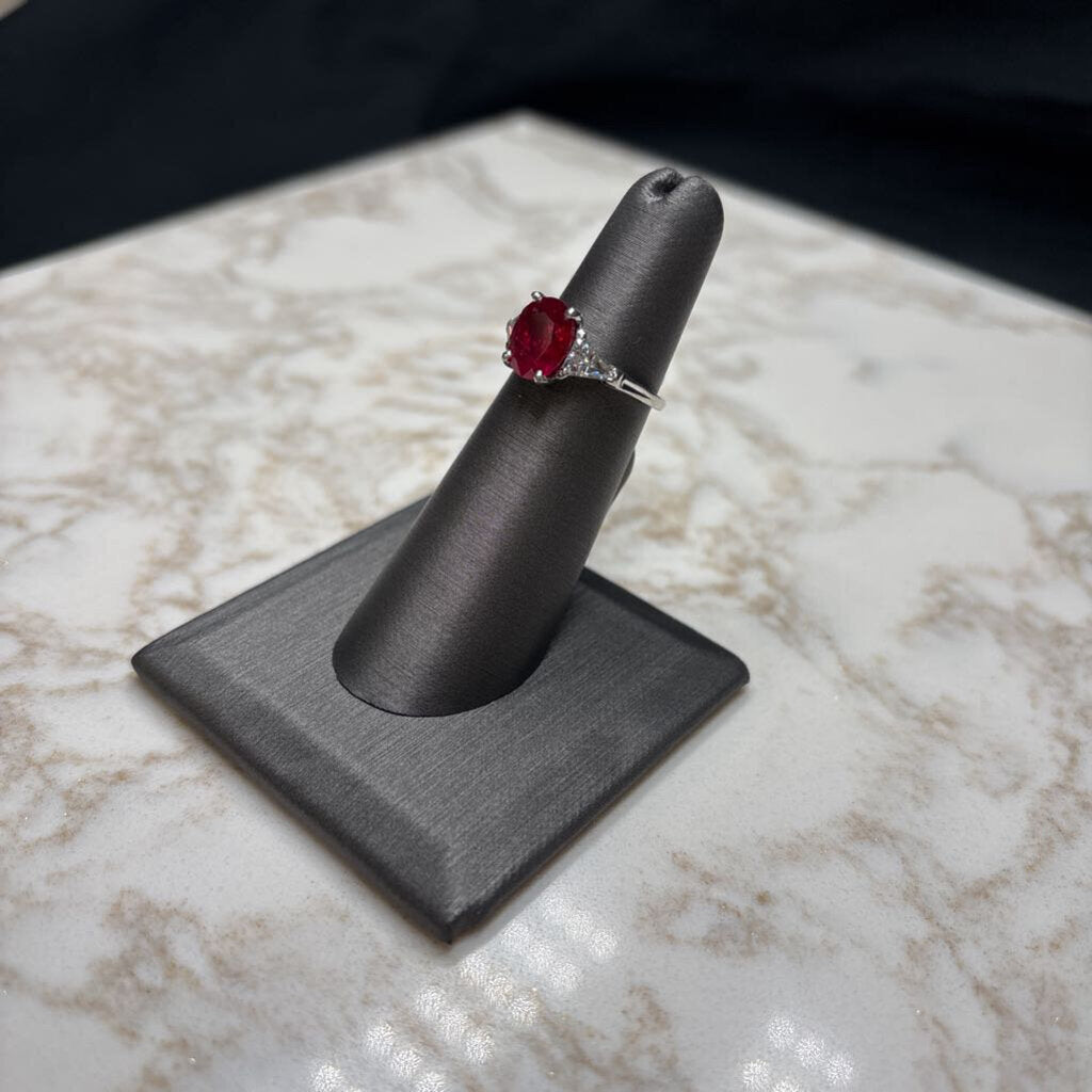 PLAT LARGE OVAL RUBY W/TRILLION CT DIAMONDS
