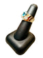 14KT YG WIDE BAND W/LG OVAL BLUE TOPAZ W/3RB MELEE