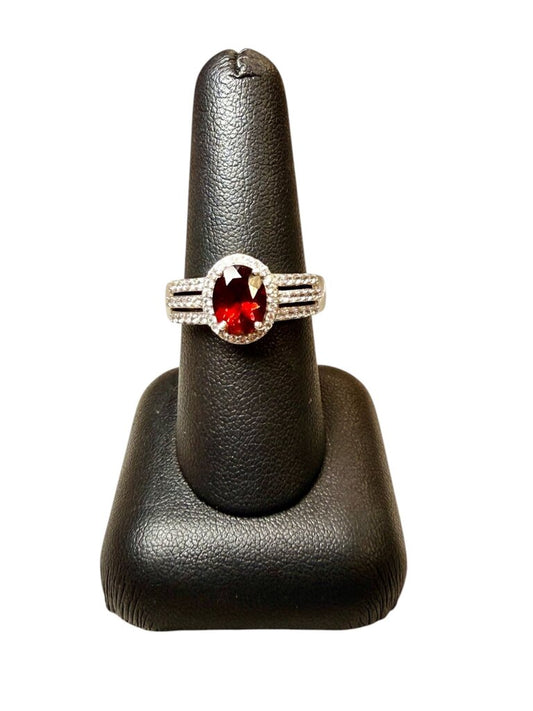 SS OVAL GARNET W/HALO RING SZ 8