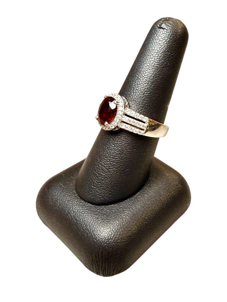 SS OVAL GARNET W/HALO RING SZ 8