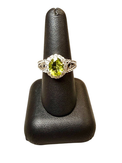 SS OVAL PERIDOT HALO STYLE RING SZ 8