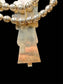 SS FRANK YAZZIE NAVAJO CORAL YEI SQUASH NECKLACE